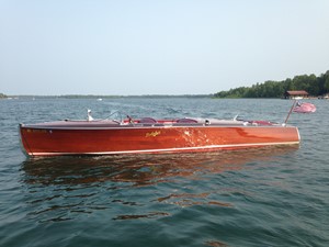 GAD-A-BOUT 0 Gleaming mahogany and classic lines