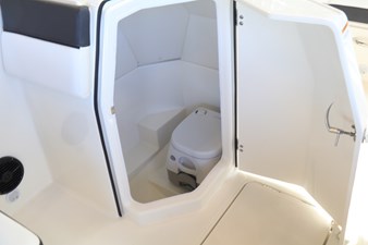 BAYLINER DX 2200 10 10. Head Door Open