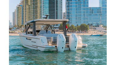 ICE 10 Saxdor 400 GTO ICE viewed from the stern, highlighting twin Mercury V10 400 engines and sleek transom design.