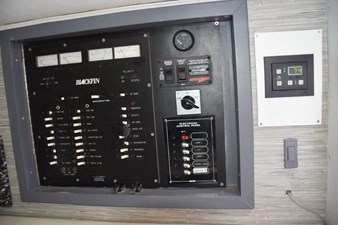 IT'S A WRAP 33 Main electrical panel and air conditioning control