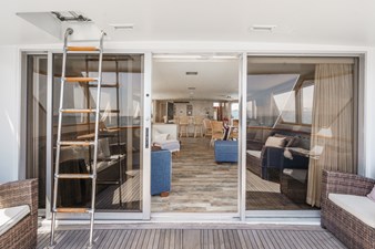 1984 Burger Raised Pilothouse 12 Aft Deck looking in to the Salon Fwd