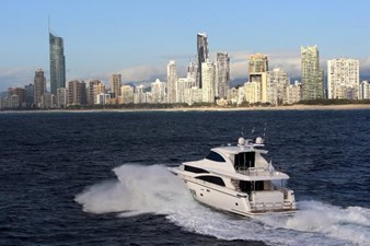 JOHNSON 83' FLYBRIDGE w/HYDRAULIC PLATFORM  15 At Sea