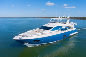 SEA HACK 1 002 - Azimut 2013 motor yacht cruising on calm blue waters under a clear sky.