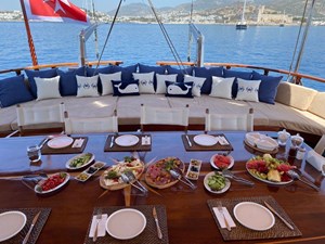 36 M COMMERCIAL GULET 12 Queen of Datca Aft Deck Table 03