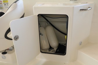 BAYLINER DX 2200 14 14. Storage In Console