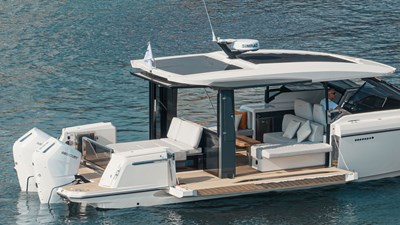 ICE 18 Modern Saxdor 400 GTO yacht with open aft deck, lounge seating, and twin Mercury outboard engines