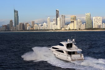 JOHNSON 80’ SKYLOUNGE W/FISHING COCKPIT  13 At sea