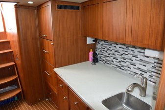 CAZADORA 22 Galley Counter with Glass Tile Backsplash   