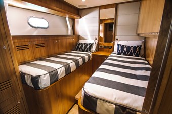 JOHNSON 80' SKYLOUNGE W/HYDRAULIC PLATFORM  6 Port side midship cabin