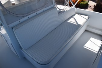 LOW BIDDER X  33 Flybridge forward lounge  