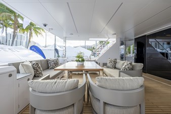 Horizon FD90  9 FD90 aft deck seating with decorative pillows. 