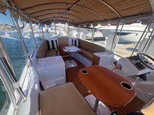 2022 Duffy 22 Cuddy Cabin 4 Movable teak table integrated with two drink holders