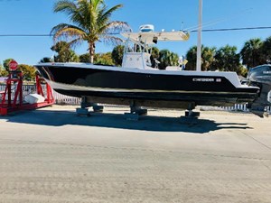 -  5 6_2004 31ft Contender 31 Open