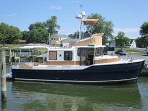 The Lovely Martha 0 2021 Ranger Tugs 31 CB at the dock