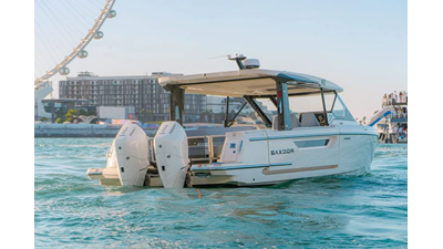 ICE 11 Saxdor 400 GTO ICE viewed from the stern, highlighting twin Mercury V10 400 engines and sleek transom design.