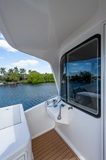 This Little Piggy  55 65_ocean_yacht_this_little_piggy_enclosed_flybridge_aft_deck_2