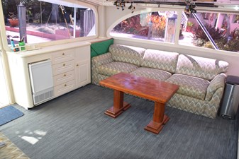 LOW BIDDER X  7 Salon table has opening leaves for dining  