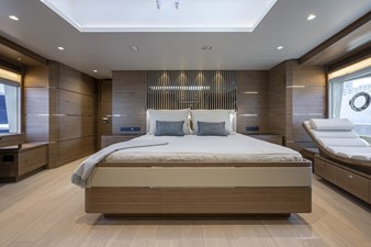 Horizon FD90  14 Master stateroom with large bed and lounger to port. 