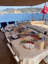 36 M COMMERCIAL GULET 10 Queen of Datca Aft Deck Table 01