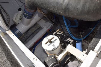 RAMPAGE 54 Port side motor aft, Racor filter, fiberglass surge tubes