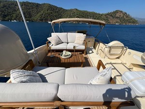 WOLF 8 Flybridge After refit, teak deck with seating group