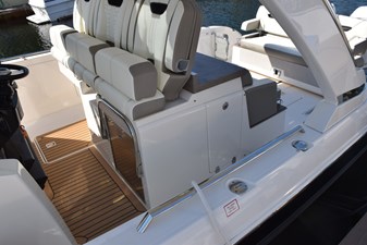 ERIKA RAY 14 Cushioned synthetic teak from helm forward and on aft platform 