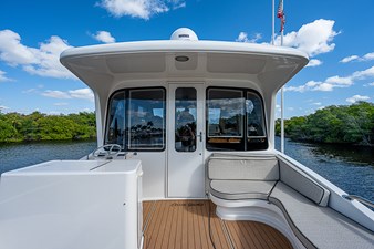 This Little Piggy  58 65_ocean_yacht_this_little_piggy_enclosed_flybridge_aft_deck_5
