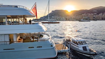 LATITUDE 8 Port Aft Door Open and Tender Alongside