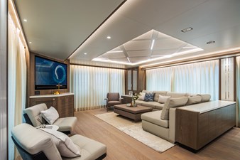 Horizon FD90 13 Horizon FD90 Hull 34 aft facing salon with custom ceiling feature and lighting.