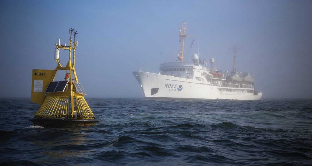 The NOAA vessel Fairweather approaches one of many data buoys, which provide real-time information critical for understanding and predicting El Niño and La Niña events, ocean currents, rogue waves, and more. photo courtesy of NOAA