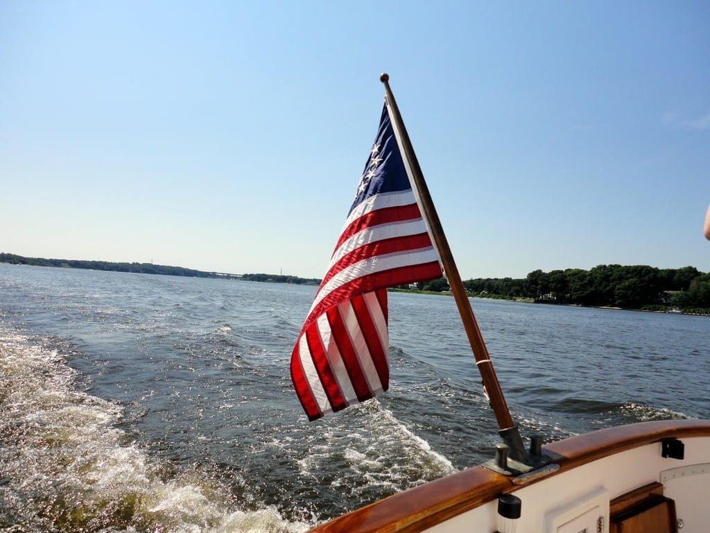 an image of an American flag on the back of a boat