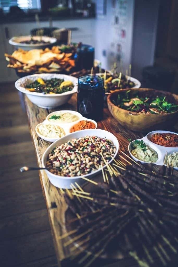 A table laden with food from a Venetian Spring menu