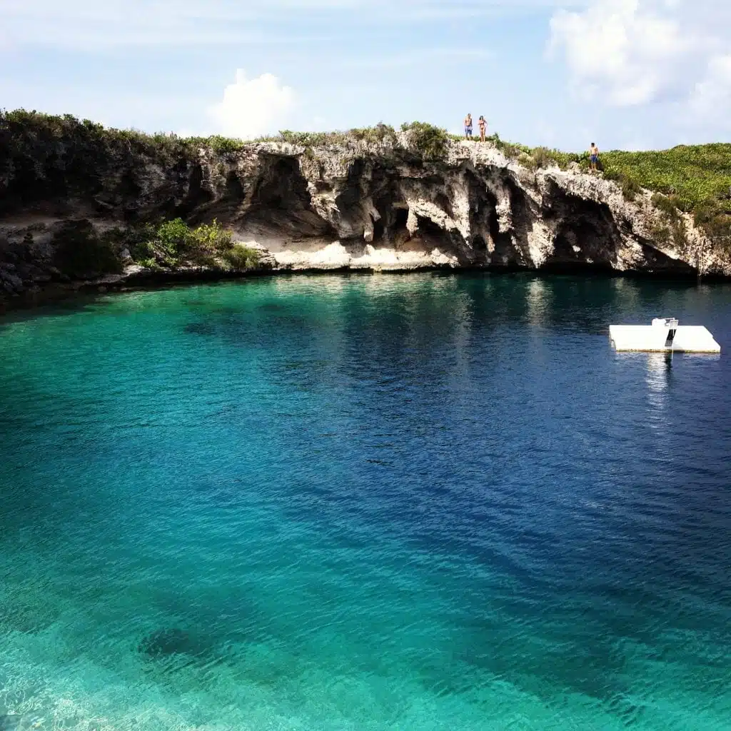Jumping into Dean's Blue Hole in Long Island, The Bahamas