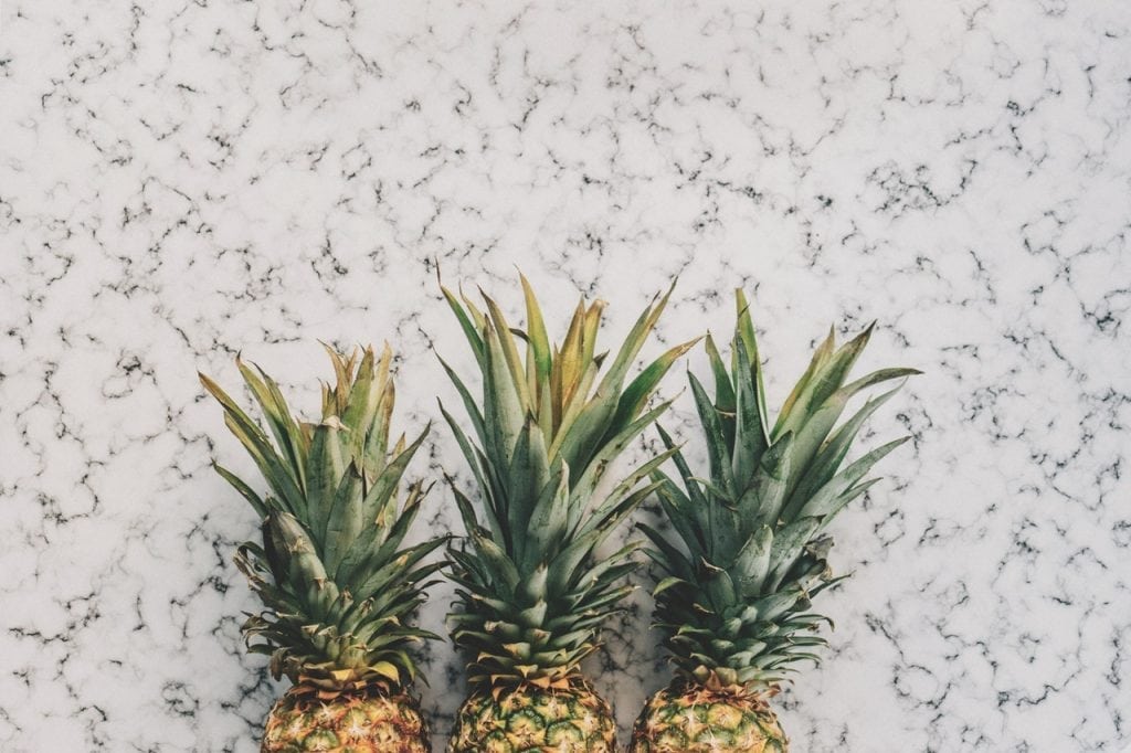 an image of three pineapple