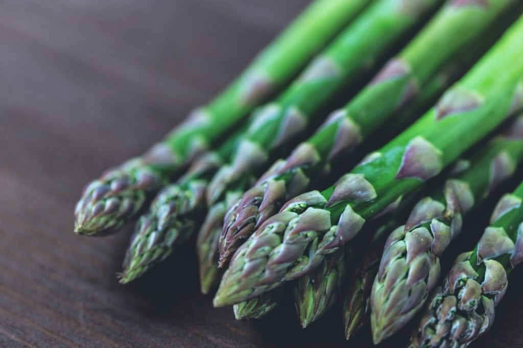An image of Asparagus before it is turned into asparagus in egg sauce.