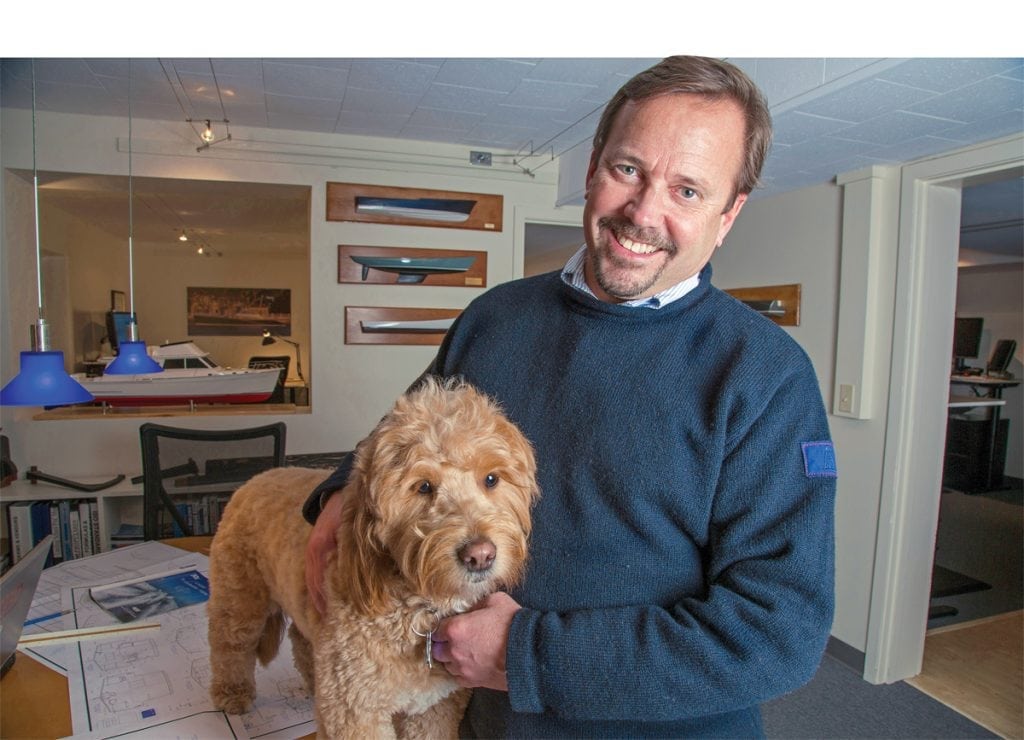yacht designer Doug Zurn with his dog