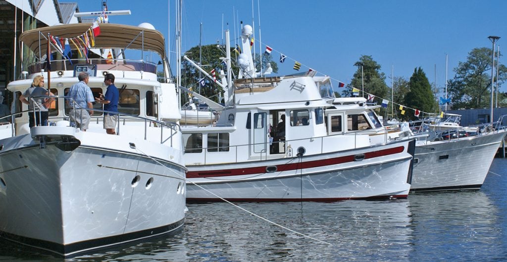 An image of three trawlers, part of Marine Trawlers Owners Association