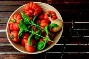 a bowl of heirloom tomatoes