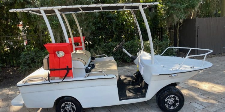 A freedom boat cart parked on the side
