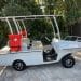 A freedom boat cart parked on the side