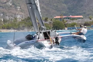 Regatta team straightening their sail boat