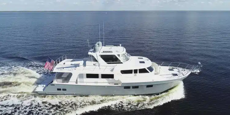 Side view of the Marlow 58E cruising in open waters