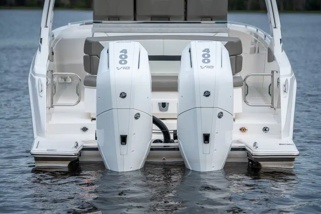 A rear view of a boat with dual Mercury Marine V10 engines