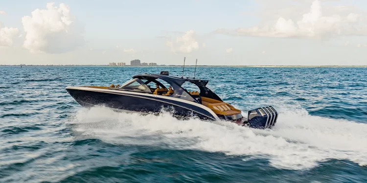 Mystic Powerboats' M5200 Boat Review Feature Image of the M5200 gliding across open water