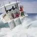 A rear view of a boat using three Yamaha XTO 450 Offshore outboards