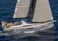 A Beneteau Oceanis 51 sailing across deep blue waters
