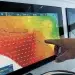 A Man points to a Furuno NavNet TZtouchXL MFDs screen