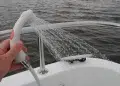 Aft Deck Freshwater Shower sprays while the boat is in open water