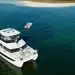 The Aquila 42 anchored near a small island