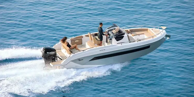 A couple crossing open water on a boat